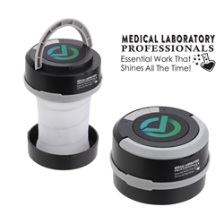 "Medical Laboratory Professionals: Essential Work That Shines All The Time!" Medi Revere Collapsible Lantern + Wireless Speaker  Lab staff recognition speaker, Laboratory staff appreciation light and speaker combo, custom speaker with light, Lantern Light and Speaker, Light and wireless speaker, bluetooth portable speaker light, employee appreciation gifts, business gifts, corporate holiday gifts, promotional speaker giveaways